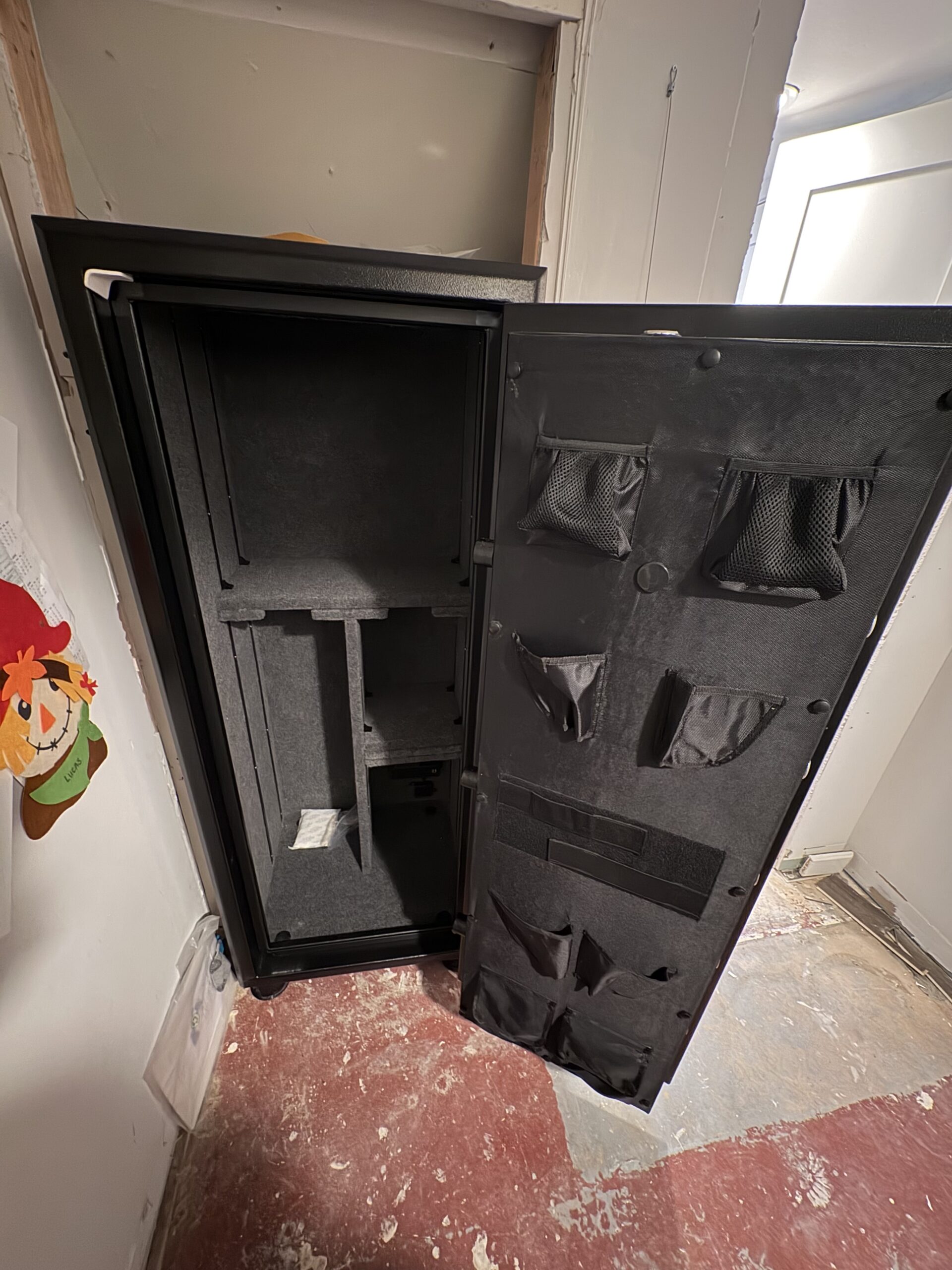 An open safe being installed in New Jersey by Berman Home Systems